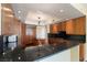 Beautiful kitchen design featuring granite countertops, hardwood floors, and stainless steel appliances at 2857 Paradise Rd # 802, Las Vegas, NV 89109