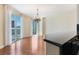 Partial shot of kitchen/living area with a view of the city through sliding glass doors at 2857 Paradise Rd # 802, Las Vegas, NV 89109