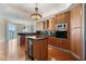 Gourmet kitchen with a center island, stainless steel appliances, and granite countertops at 2857 Paradise Rd # 802, Las Vegas, NV 89109