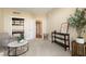 Cozy living room with neutral carpet, seating area, and shelving with views of the community at 2857 Paradise Rd # 802, Las Vegas, NV 89109