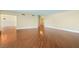 Expansive living room featuring pristine hardwood floors, neutral paint, and open layout at 2857 Paradise Rd # 802, Las Vegas, NV 89109