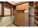 Walk-in closet featuring custom shelving and drawers, providing ample storage space at 2857 Paradise Rd # 802, Las Vegas, NV 89109