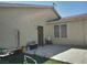 Backyard area with a patio, minimal landscaping, and a glimpse of the home's exterior at 2920 Malibou Ave, Pahrump, NV 89048