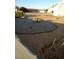 Desert landscaping with gravel features for low-maintenance appeal and interesting contrast at 2920 Malibou Ave, Pahrump, NV 89048