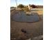 Landscaped yard featuring gravel and desert plants for easy maintenance and water conservation at 2920 Malibou Ave, Pahrump, NV 89048