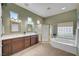 Bathroom boasts double sinks, large vanity, standing shower, and garden tub at 2929 Haddon Dr, Las Vegas, NV 89134