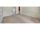 Bedroom featuring neutral walls, carpet flooring, and a hallway with a door leading to other rooms at 2929 Haddon Dr, Las Vegas, NV 89134