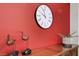 Dining area with accent wall featuring stylish decor and a modern clock at 2929 Haddon Dr, Las Vegas, NV 89134