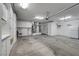 Spacious garage with ample storage cabinets and a utility sink for convenience at 2929 Haddon Dr, Las Vegas, NV 89134
