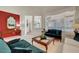 Open-concept living area with comfortable seating, bright windows, and elegant interior design elements at 2929 Haddon Dr, Las Vegas, NV 89134