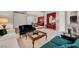 Spacious living room features comfortable seating, a decorative coffee table, and adjacent dining area at 2929 Haddon Dr, Las Vegas, NV 89134