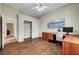 Home office featuring built-in desk, wood floors, and lots of storage at 2929 Haddon Dr, Las Vegas, NV 89134