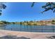 Scenic pond view with walking path, lush trees, and serene water feature at 2929 Haddon Dr, Las Vegas, NV 89134