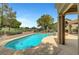 Gorgeous backyard pool and spa with golf course views and adjacent patio at 2929 Haddon Dr, Las Vegas, NV 89134