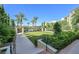 Exterior shot of dog park, grass and trees at 30 Strada Di Villaggio # 306, Henderson, NV 89011