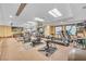 Community gym featuring cardio machines, free weights, and ample space at 30 Strada Di Villaggio # 306, Henderson, NV 89011