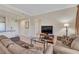 Well-appointed living room featuring comfortable seating, soft lighting, and neutral tones at 30 Strada Di Villaggio # 306, Henderson, NV 89011