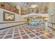 Elegant lobby featuring tile floors, seating areas, and high ceilings at 30 Strada Di Villaggio # 306, Henderson, NV 89011
