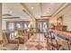 Comfortable lounge area with seating, bar, decorative lighting, and a stylish decor at 30 Strada Di Villaggio # 306, Henderson, NV 89011