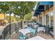 Charming outdoor patio with comfortable seating, perfect for enjoying meals in a relaxed atmosphere at 30 Strada Di Villaggio # 306, Henderson, NV 89011