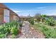 Scenic backyard featuring desert landscaping, a rock garden, and a peaceful outdoor space at 3101 Greenbriar Dr, Las Vegas, NV 89121