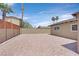 Large backyard featuring desert landscaping and tall privacy walls at 3101 Greenbriar Dr, Las Vegas, NV 89121