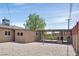 Spacious backyard featuring a built-in barbecue area and low-maintenance desert landscaping at 3101 Greenbriar Dr, Las Vegas, NV 89121