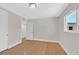 Bedroom features wood floors, a closet, and a window at 3101 Greenbriar Dr, Las Vegas, NV 89121