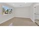 Well-lit bedroom with a large window offering a pleasant view of the neighborhood at 3101 Greenbriar Dr, Las Vegas, NV 89121