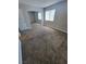 Bedroom featuring sliding mirrored closet doors, a window, and neutral paint at 3151 Soaring Gulls Dr # 2101, Las Vegas, NV 89128