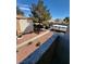 An exterior angle showcases the landscaping of the community and the covered parking at 3151 Soaring Gulls Dr # 2101, Las Vegas, NV 89128