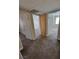 Hallway with carpet leading to various doorways and rooms with neutral paint at 3151 Soaring Gulls Dr # 2101, Las Vegas, NV 89128