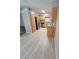 Bright kitchen features wood-look flooring, granite countertops, and stainless-steel appliances, blending style and functionality at 3151 Soaring Gulls Dr # 2101, Las Vegas, NV 89128