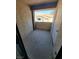Outdoor patio with a concrete floor and partial view of neighboring houses offers a private and open-air relaxation spot at 3151 Soaring Gulls Dr # 2101, Las Vegas, NV 89128
