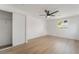 Open bedroom with bright lighting, a ceiling fan, and spacious closet at 343 W Basic Rd, Henderson, NV 89015