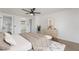 Comfortable bedroom featuring white walls, wood-look floors, and bright, natural light at 343 W Basic Rd, Henderson, NV 89015