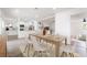 Dining area with an open layout adjacent to the kitchen and living spaces at 343 W Basic Rd, Henderson, NV 89015