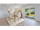 Dining room with sliding glass doors and backyard access at 343 W Basic Rd, Henderson, NV 89015