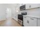 Bright kitchen equipped with modern appliances, stylish cabinetry, and plenty of countertop space at 343 W Basic Rd, Henderson, NV 89015