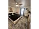 Bright bedroom with a contemporary bed, desk, and decorative art, creating a serene space at 369 Stone Fly Rd, North Las Vegas, NV 89032