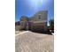 Charming two-story home with a two-car garage and beautifully paved driveway at 369 Stone Fly Rd, North Las Vegas, NV 89032