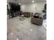 Spacious living room featuring recessed lighting, marble floors, and fireplace at 369 Stone Fly Rd, North Las Vegas, NV 89032