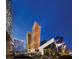 Modern high-rise buildings in an urban setting at night with manicured landscaping at 3722 Las Vegas Blvd # 2709, Las Vegas, NV 89158