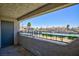 Relax on the balcony with views of the community pool and tennis courts at 3770 Shirebrook Dr # 160, Las Vegas, NV 89115