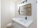 Bright bathroom features a modern vanity, sleek black hardware, and a stylish mirror at 3770 Shirebrook Dr # 160, Las Vegas, NV 89115