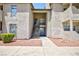 Exterior view of the building showcasing its architecture and well-kept landscaping at 3770 Shirebrook Dr # 160, Las Vegas, NV 89115