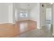 Bright living room with light wood floors, neutral walls, and ample natural light at 392 Waterwheel Falls Dr, Henderson, NV 89015