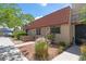 View of the townhome featuring desert landscaping at 4000 Visby Ln, Las Vegas, NV 89119
