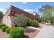 Charming exterior of a two-story townhome with well-maintained landscaping at 4000 Visby Ln, Las Vegas, NV 89119