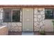 Charming front entrance with decorative security door and stone facade at 4000 Visby Ln, Las Vegas, NV 89119